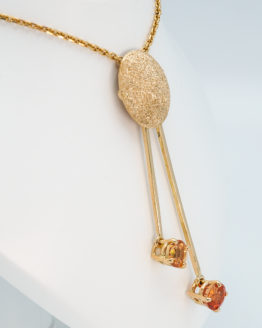 Pendentif or jaune saphirs oranges