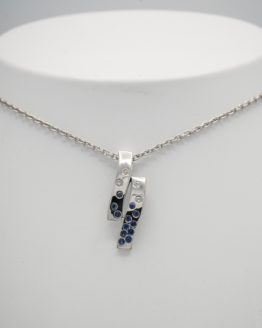 Pendentif or blanc saphirs diamants